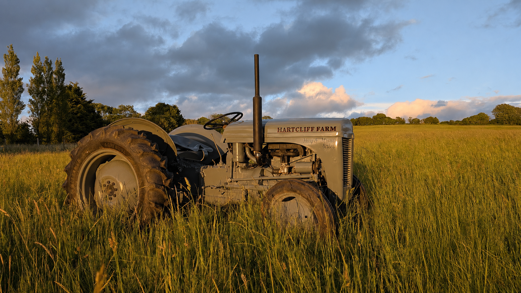 the hartcliff farm ferguson at sunset